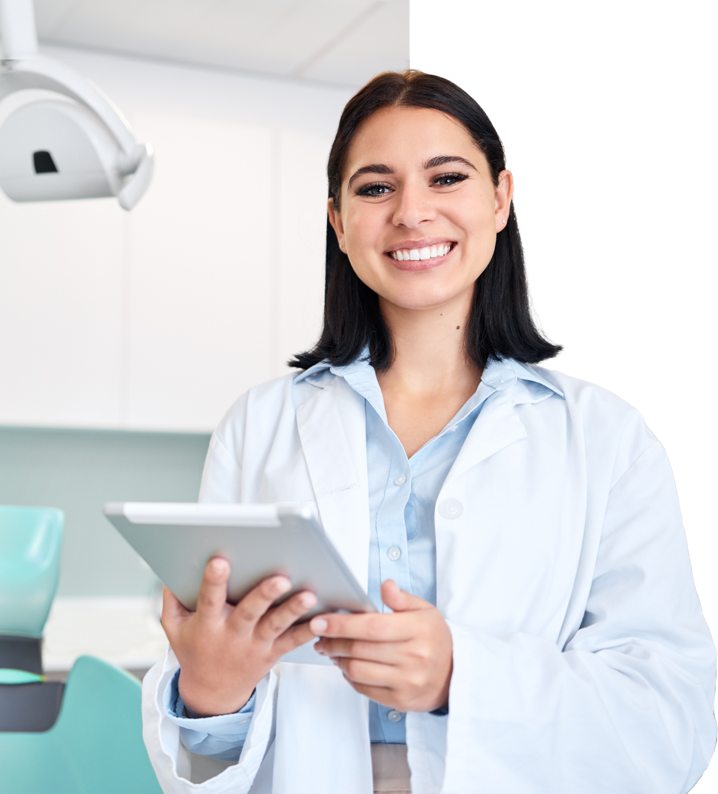Oryx Dental - Happy Female Dentist Happy female dentist holding clipboard.
